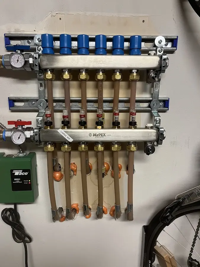 Plumber performing Water Heater Repair at a residential property in Bartonville